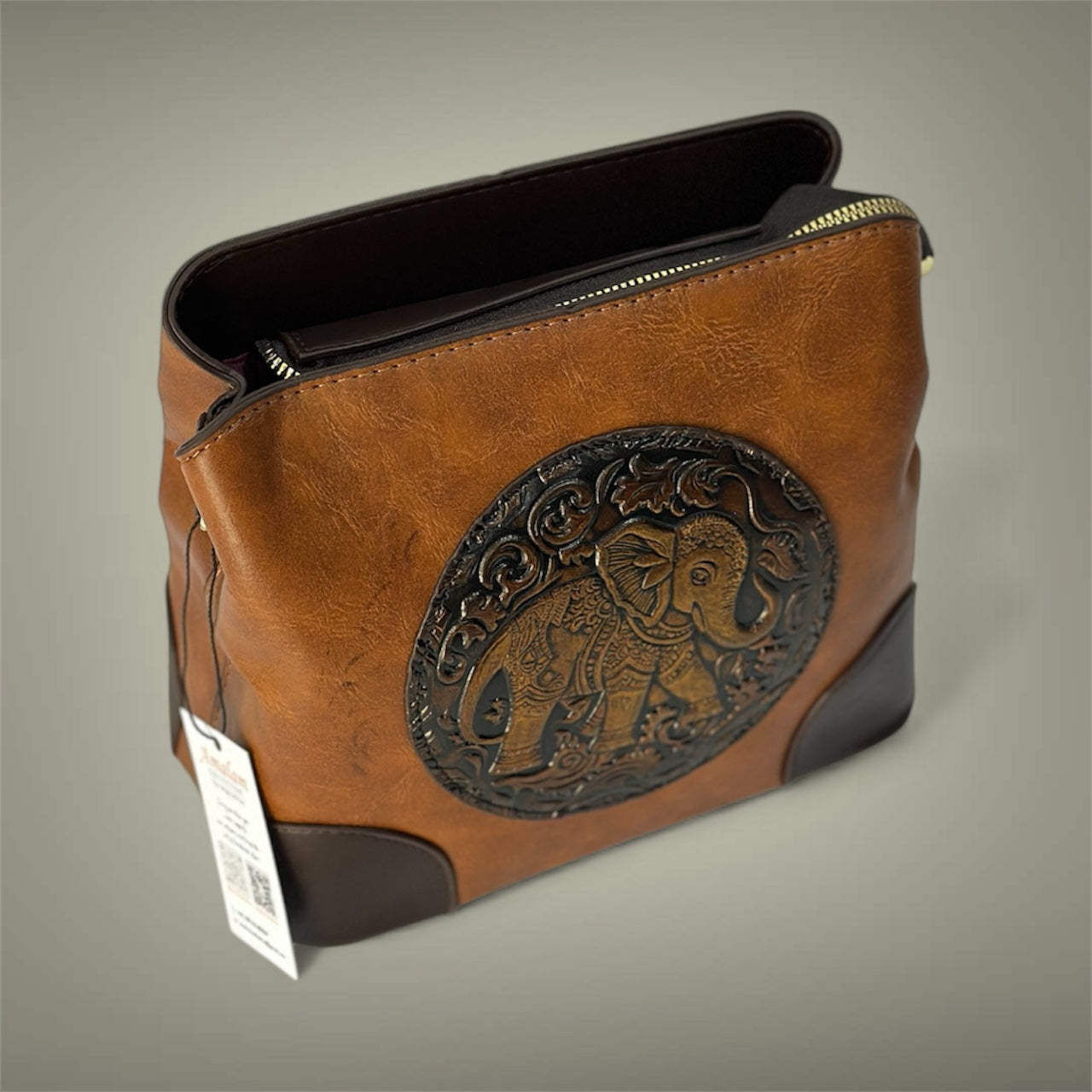 Handcrafted Brown Pouch with Elephant Embossing – Artisan Zip Bag